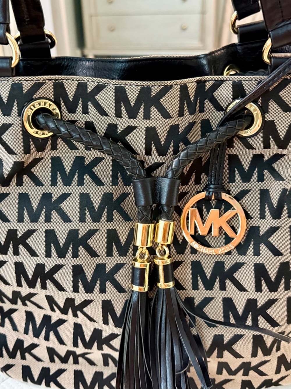 Michael Kors Black and Beige MK Logo Drawstring Tote with Gold Hardware